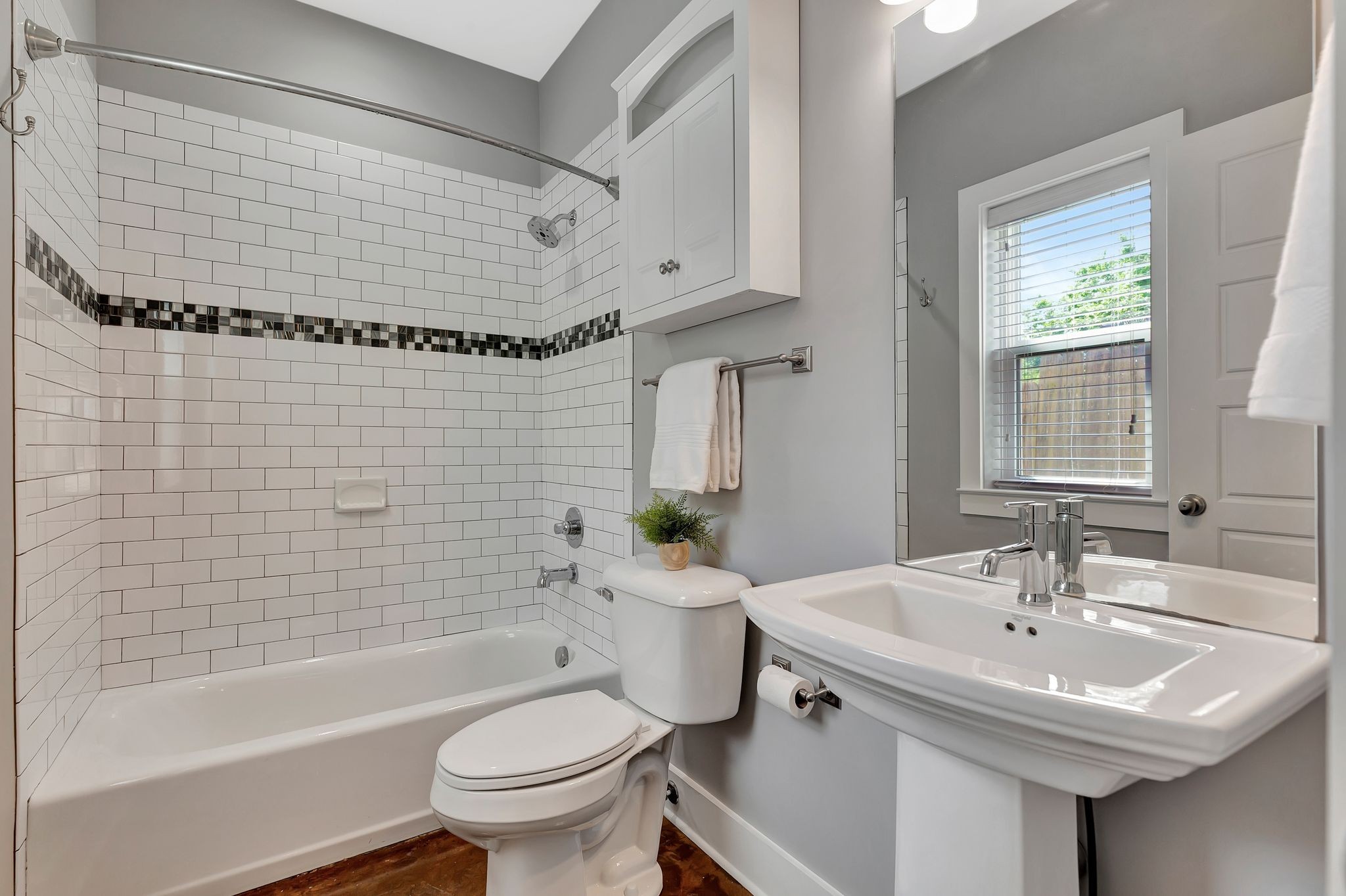 2003 Convent Place, Unit 9 Nashville, TN 37212 - Photo 6 of 31 a bathroom with a sink toilet and shower