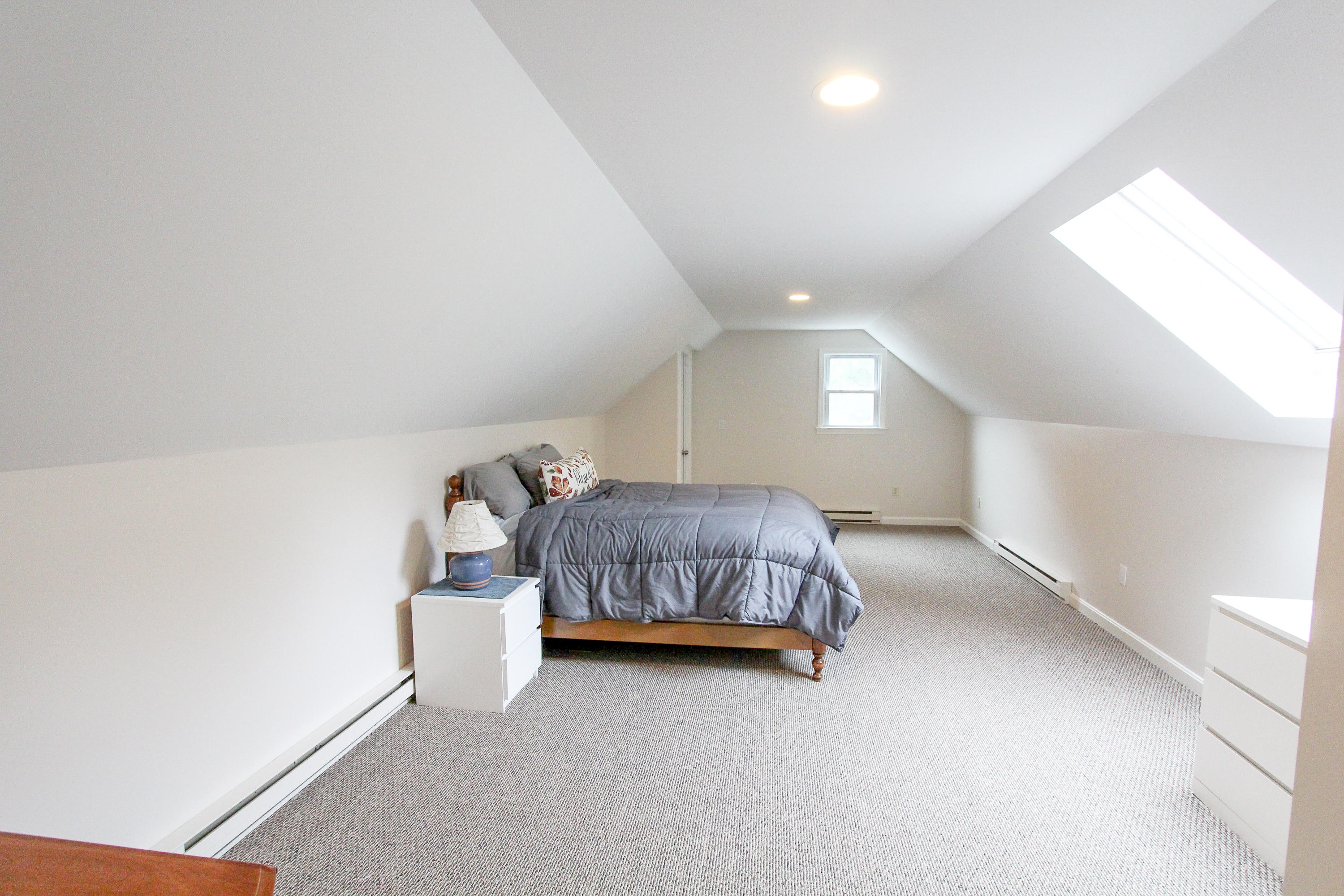 199 Skunknet Road Centerville, MA 02632 - Photo 25 of 37 a bedroom with a bed and window