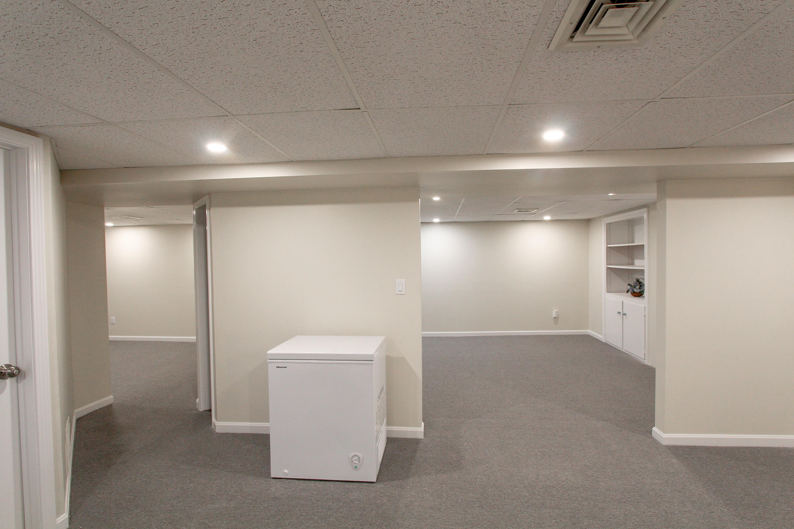 199 Skunknet Road Centerville, MA 02632 - Photo 31 of 37 an empty room with windows and closet
