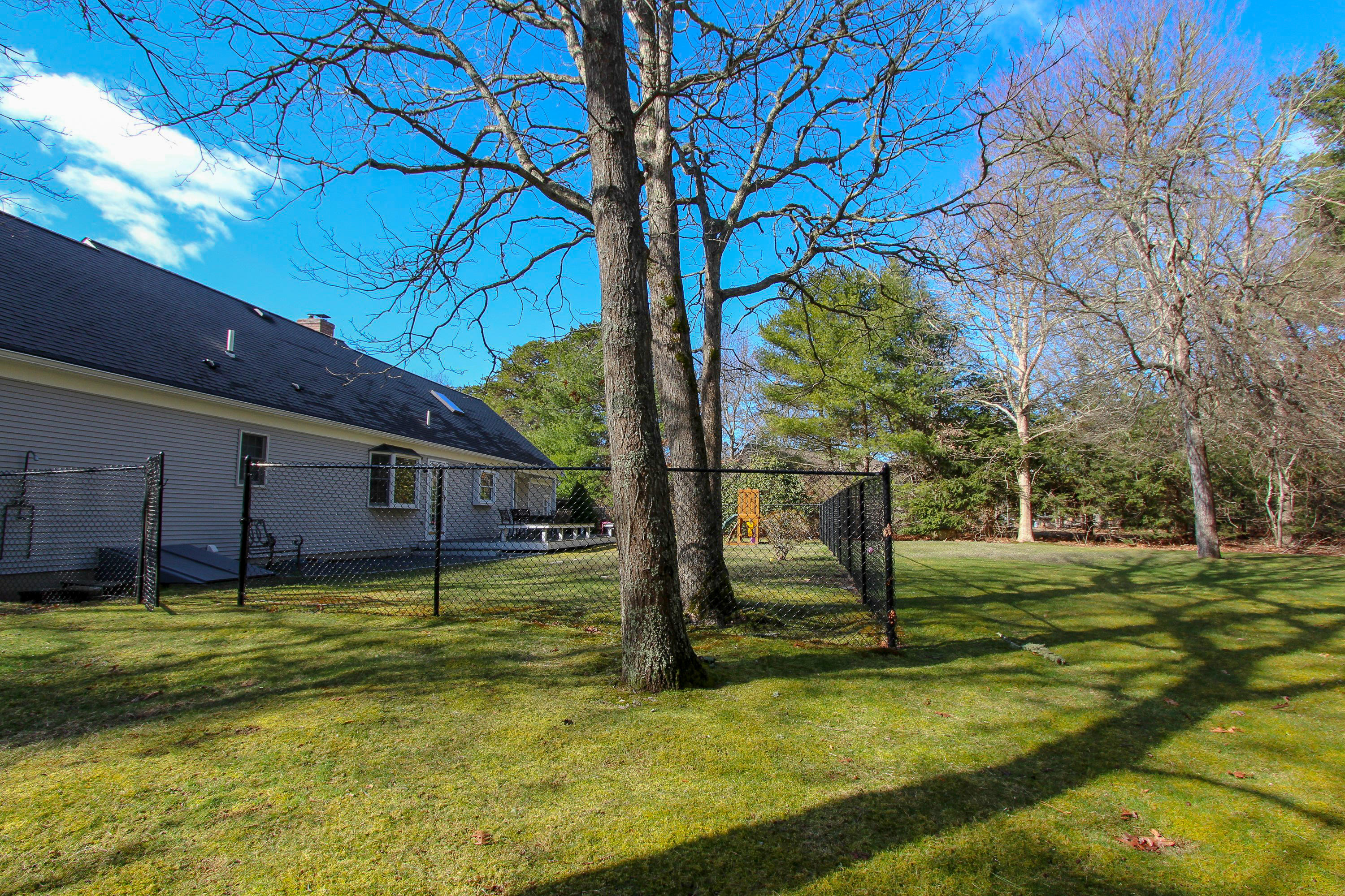 199 Skunknet Road Centerville, MA 02632 - Photo 7 of 37 a view of a house with a yard