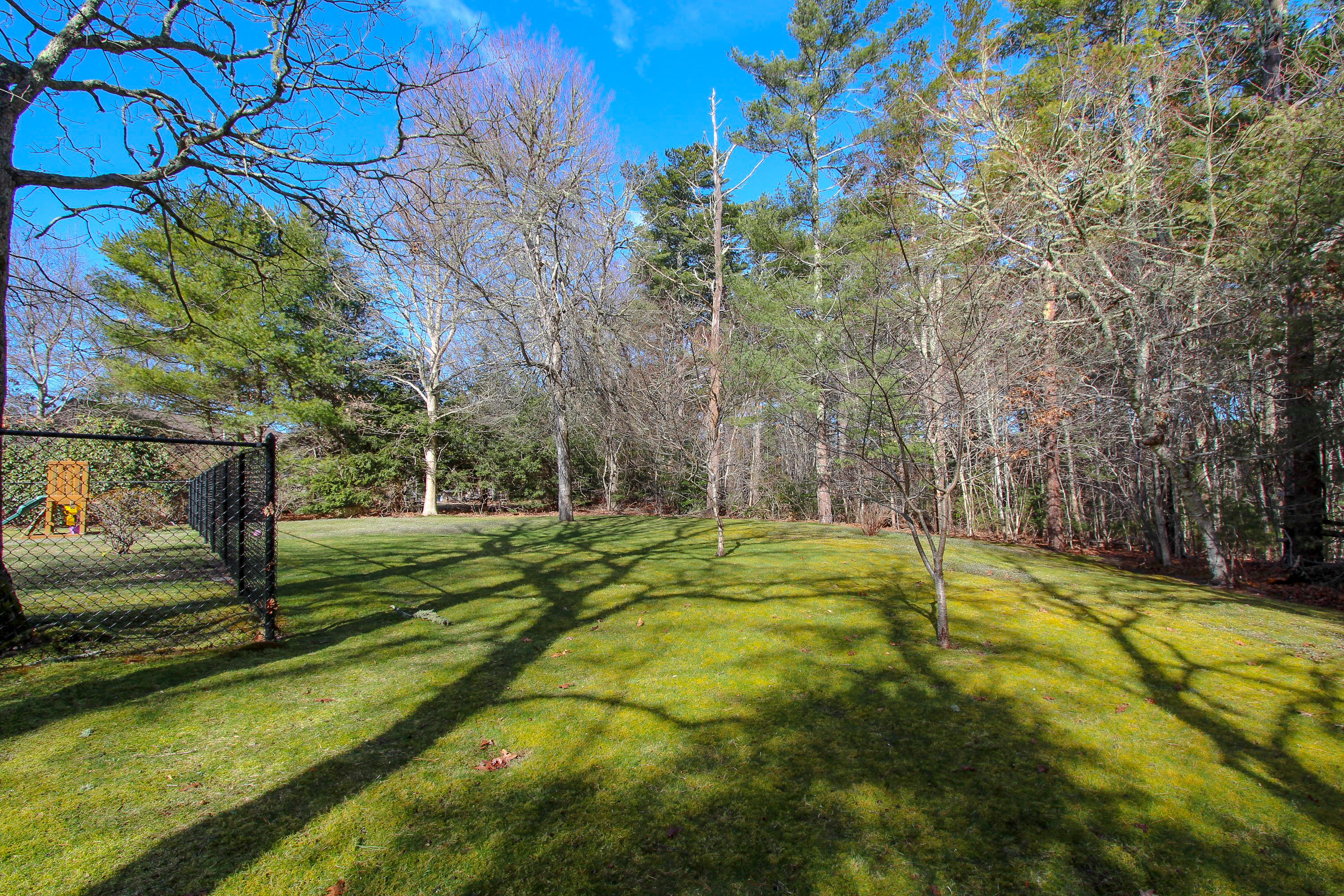 199 Skunknet Road Centerville, MA 02632 - Photo 8 of 37 a view of swimming pool with a yard