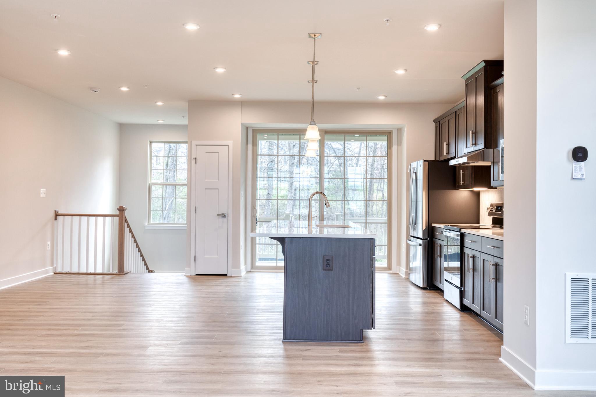 3433 Jacobs Ford Way Hanover, MD 21076 - Photo 18 of 37 a view of kitchen with furniture and wooden floor