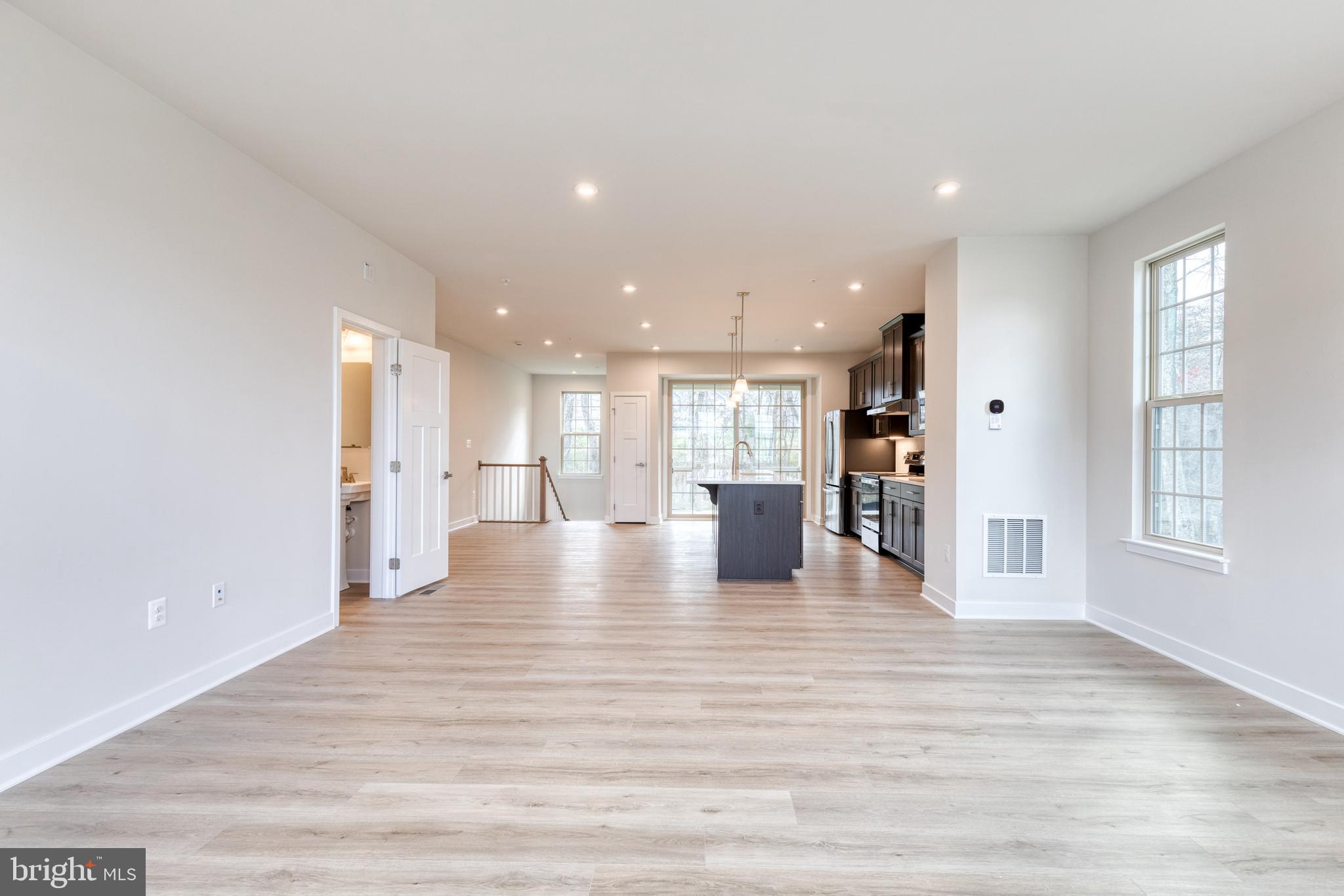 3433 Jacobs Ford Way Hanover, MD 21076 - Photo 21 of 37 a view of an empty room with kitchen and window