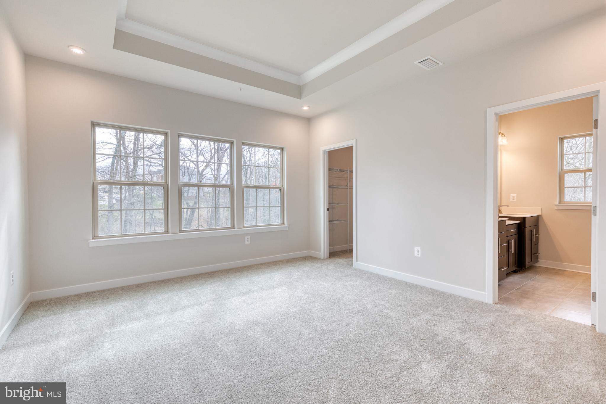 3433 Jacobs Ford Way Hanover, MD 21076 - Photo 25 of 37 an empty room with windows and bathroom view