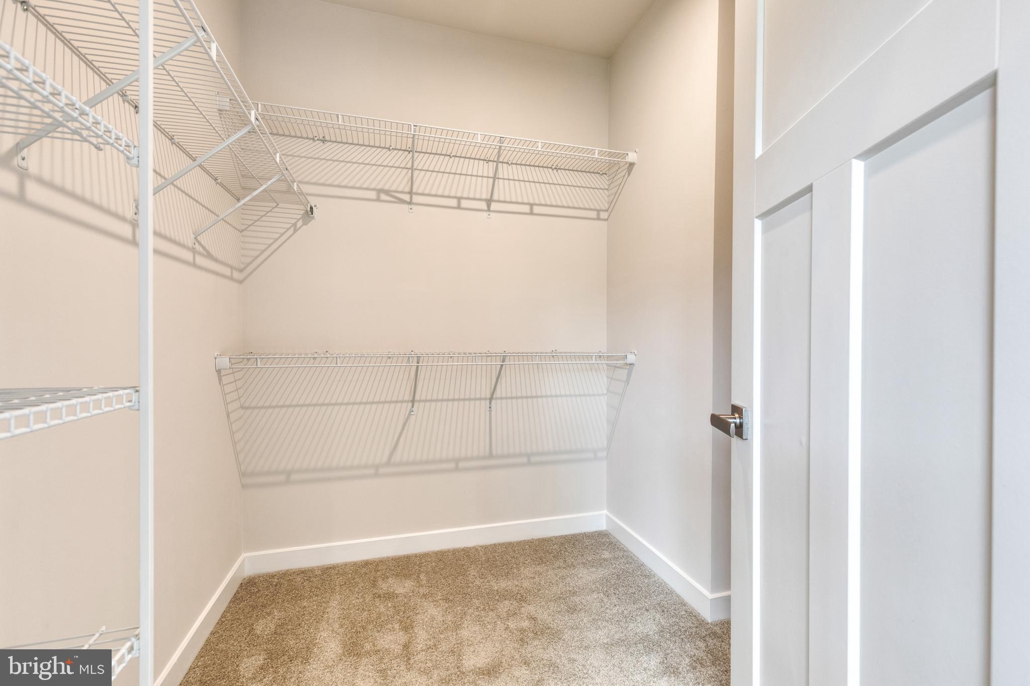 3433 Jacobs Ford Way Hanover, MD 21076 - Photo 28 of 37 a view of a room with racks on the wall