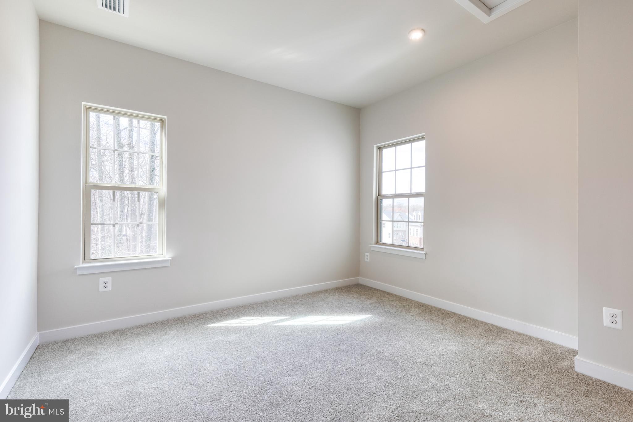 3433 Jacobs Ford Way Hanover, MD 21076 - Photo 29 of 37 an empty room with windows