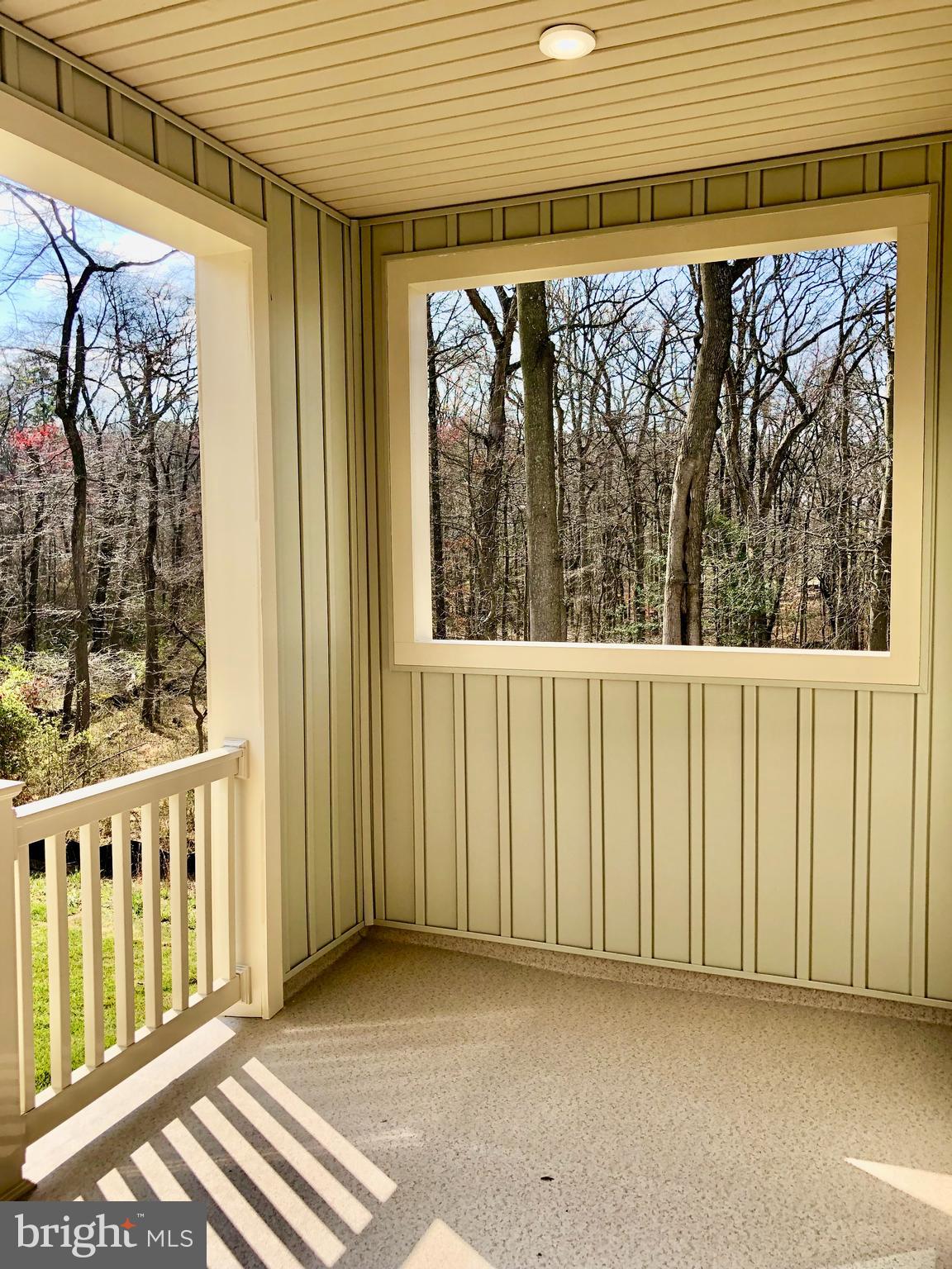 3433 Jacobs Ford Way Hanover, MD 21076 - Photo 5 of 37 a view of a balcony with wooden floor and outdoor space