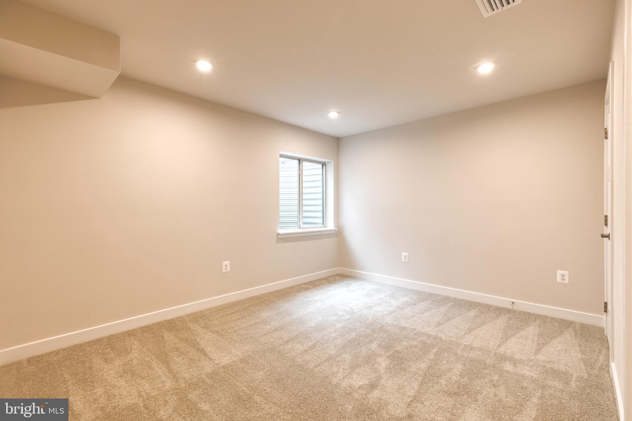 3433 Jacobs Ford Way Hanover, MD 21076 - Photo 9 of 37 an empty room with windows