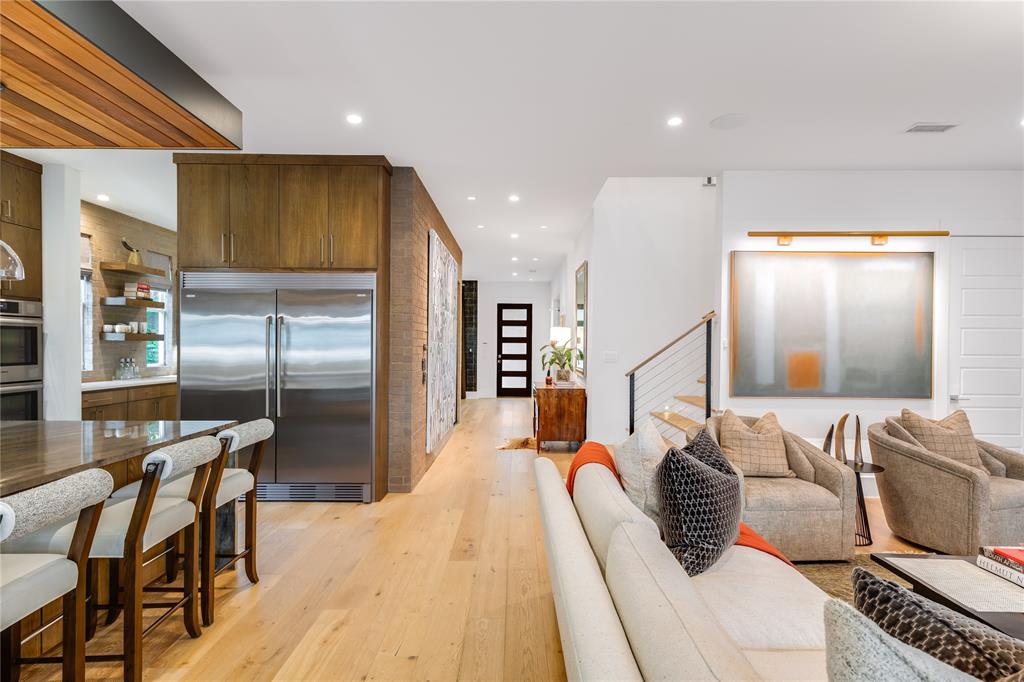 5531 Goodwin Avenue Dallas, TX 75206 - Photo 13 of 39 Living room with light wood finished floors and recessed lighting