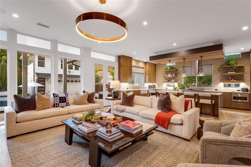 5531 Goodwin Avenue Dallas, TX 75206 - Photo 18 of 39 Living room featuring recessed lighting, healthy amount of natural light, and french doors