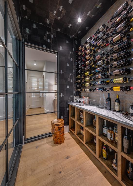 5531 Goodwin Avenue Dallas, TX 75206 - Photo 21 of 39 Wine cellar with light wood-style floors and recessed lighting