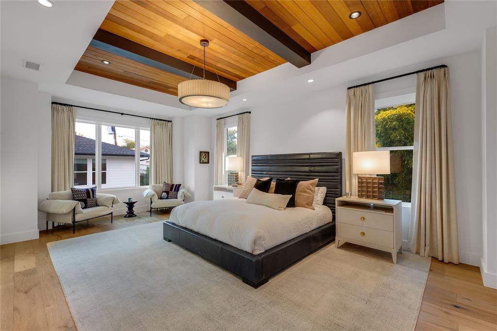 5531 Goodwin Avenue Dallas, TX 75206 - Photo 24 of 39 Bedroom with light wood-style floors, recessed lighting, and a wooden ceiling with exposed beams