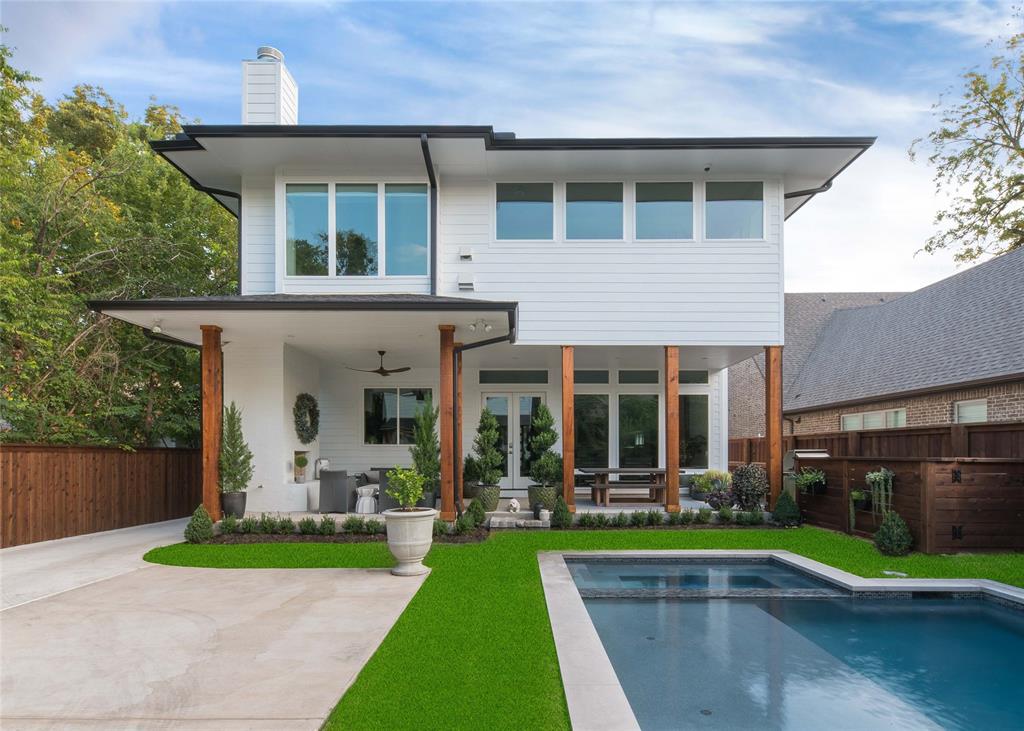 5531 Goodwin Avenue Dallas, TX 75206 - Photo 37 of 39 Back of property featuring a pool with connected hot tub, a patio, french doors, a chimney, and a ceiling fan