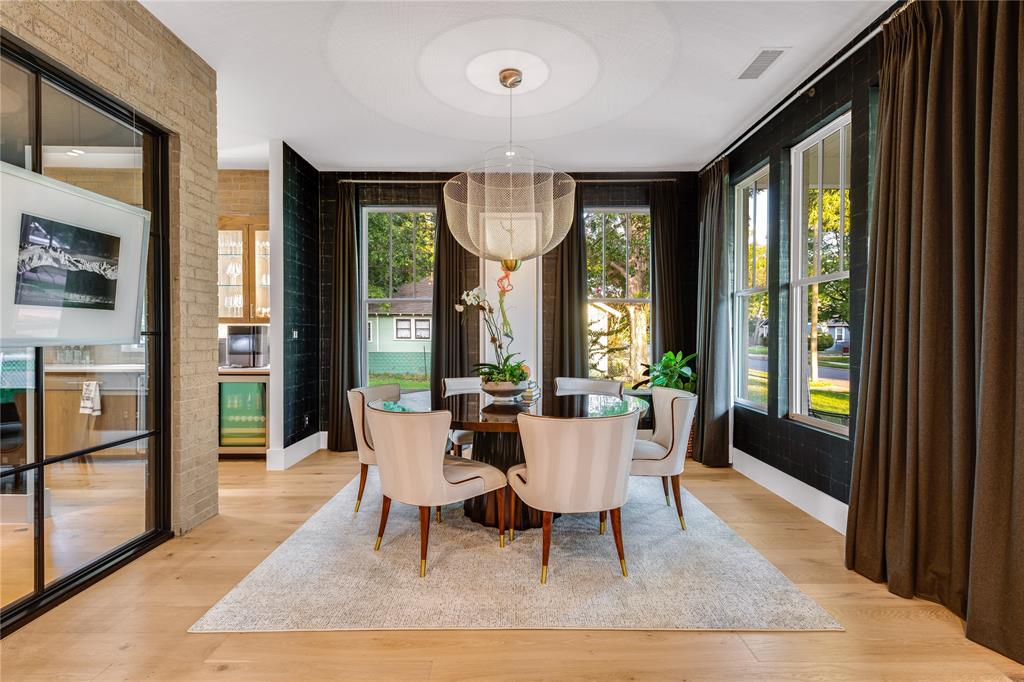 5531 Goodwin Avenue Dallas, TX 75206 - Photo 5 of 39 Dining area featuring light wood finished floors