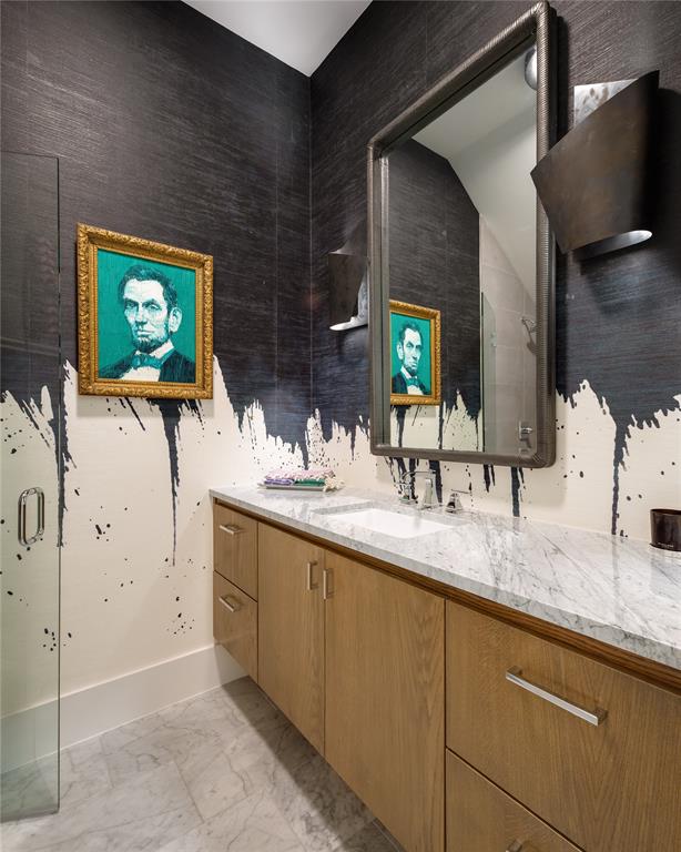 5531 Goodwin Avenue Dallas, TX 75206 - Photo 8 of 39 Full bath featuring vanity and light marble finish flooring