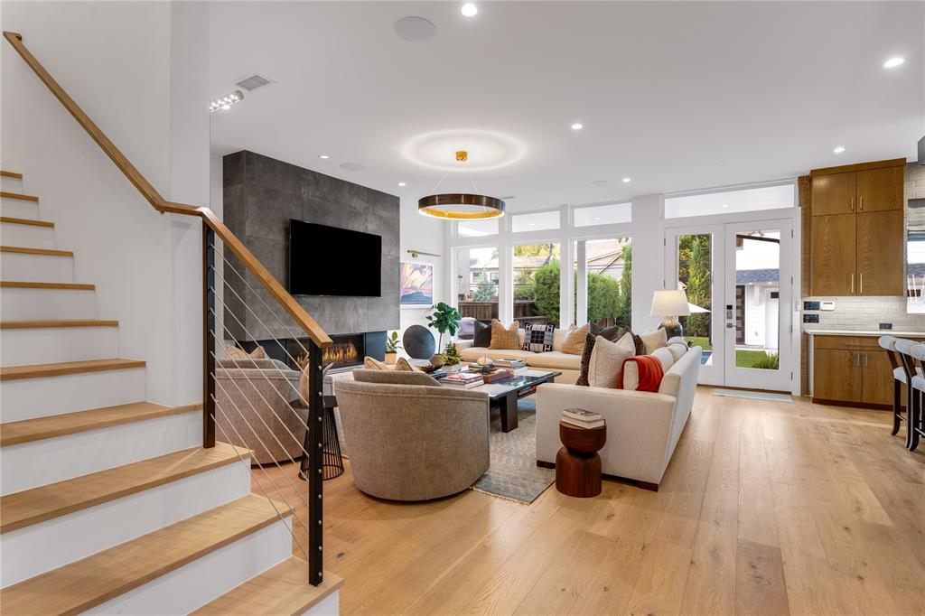5531 Goodwin Avenue Dallas, TX 75206 - Photo 10 of 39 Living area with light wood-style floors, french doors, and recessed lighting