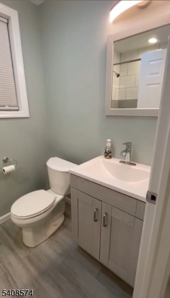 37 Edison Street Bloomfield, NJ 07003 - Photo 9 of 11 a bathroom with a toilet sink and mirror