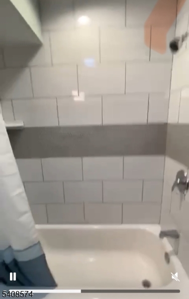 37 Edison Street Bloomfield, NJ 07003 - Photo 10 of 11 a bathroom with a bathtub