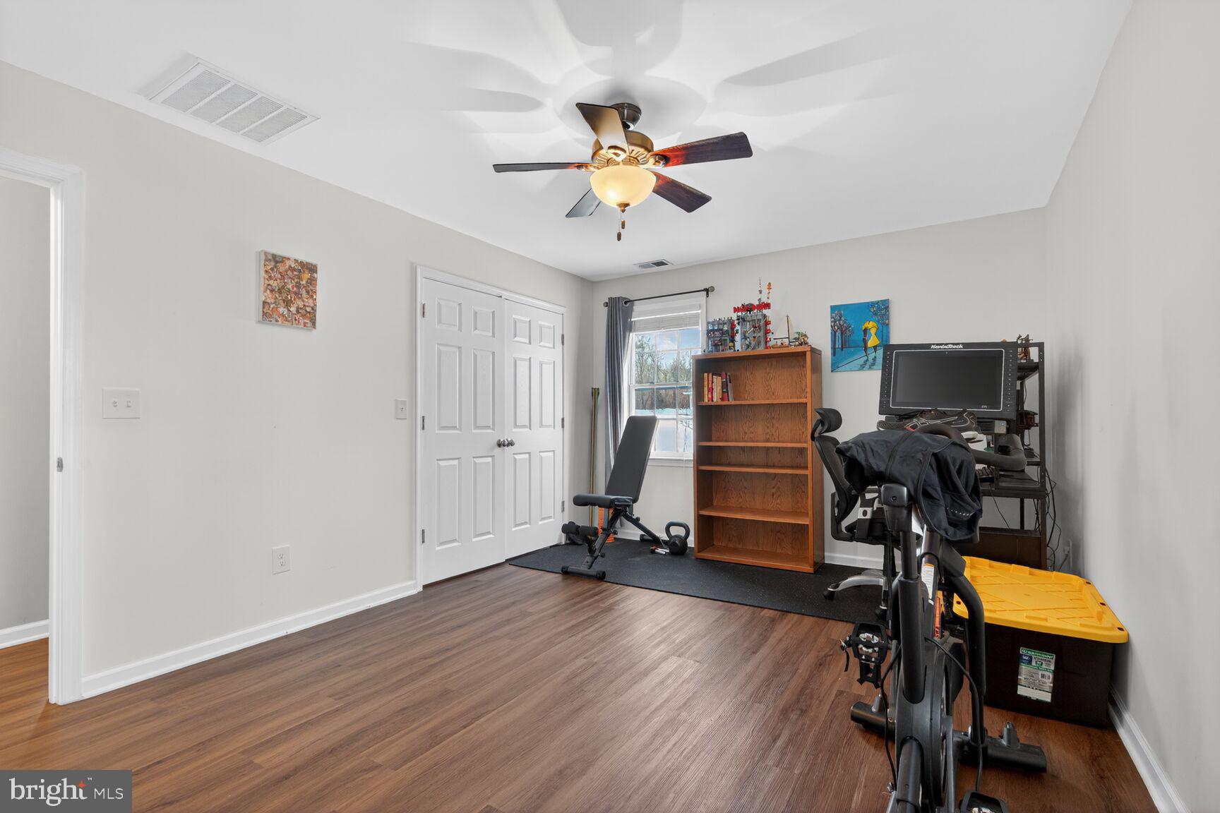599 Widewater Road Stafford, VA 22554 - Photo 11 of 27 a view of a workspace with furniture and a window