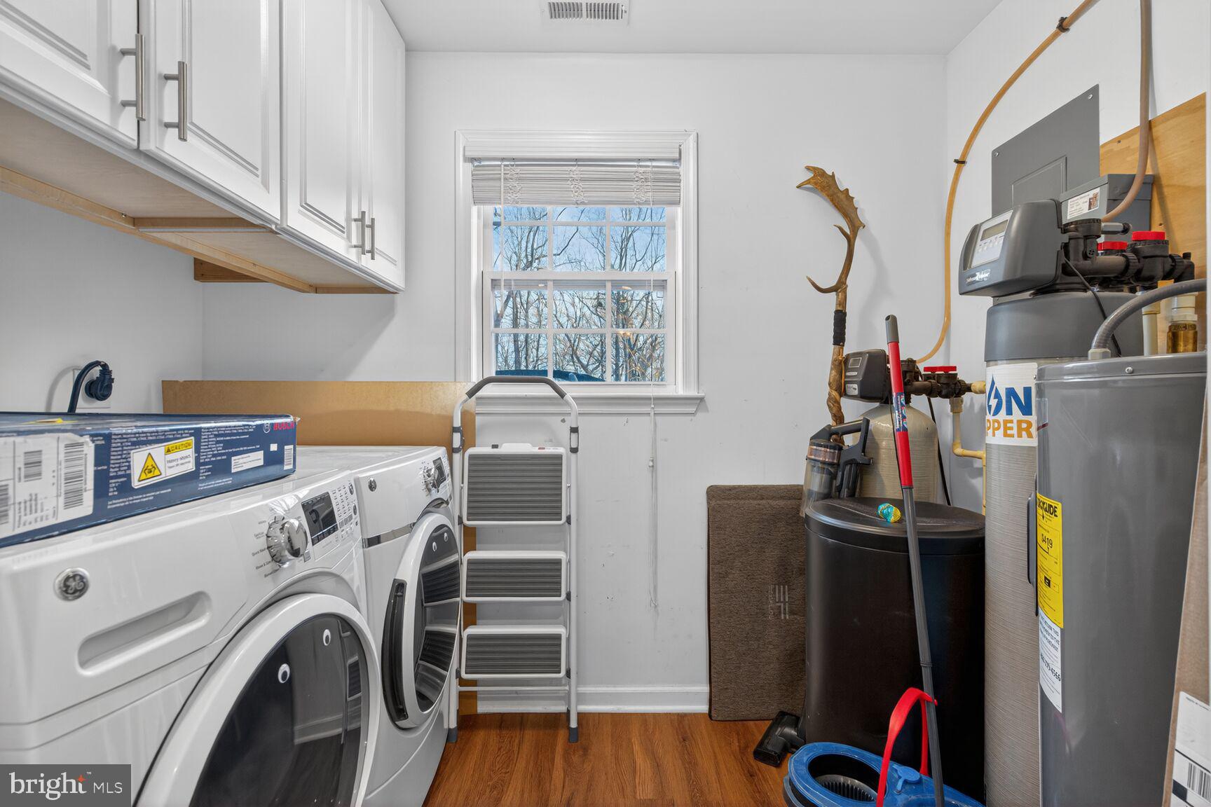 599 Widewater Road Stafford, VA 22554 - Photo 14 of 27 a view of a kitchen with fridge and workspace