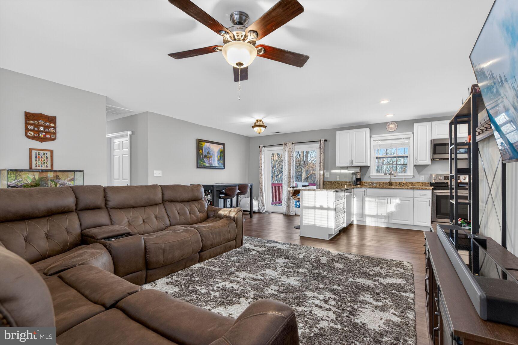 599 Widewater Road Stafford, VA 22554 - Photo 21 of 27 a living room with furniture and kitchen view