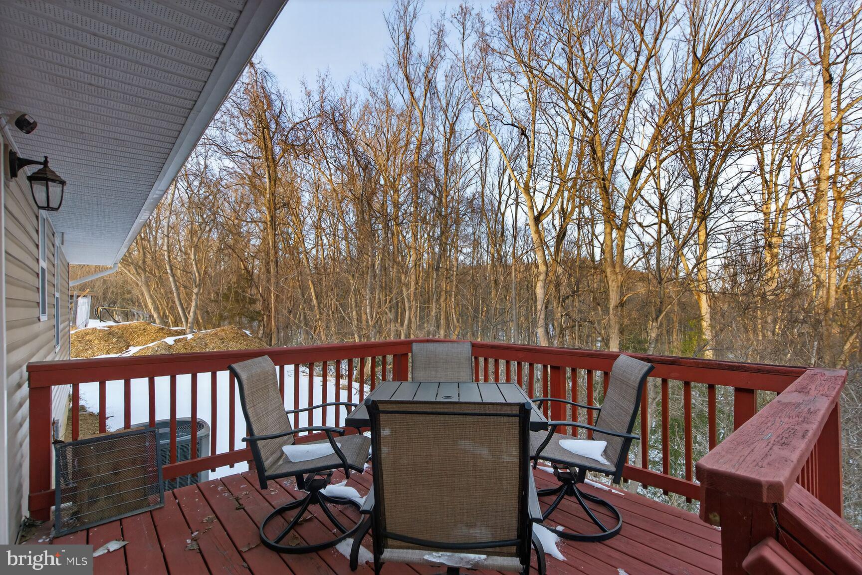 599 Widewater Road Stafford, VA 22554 - Photo 4 of 27 a view of a deck with furniture and wooden fence