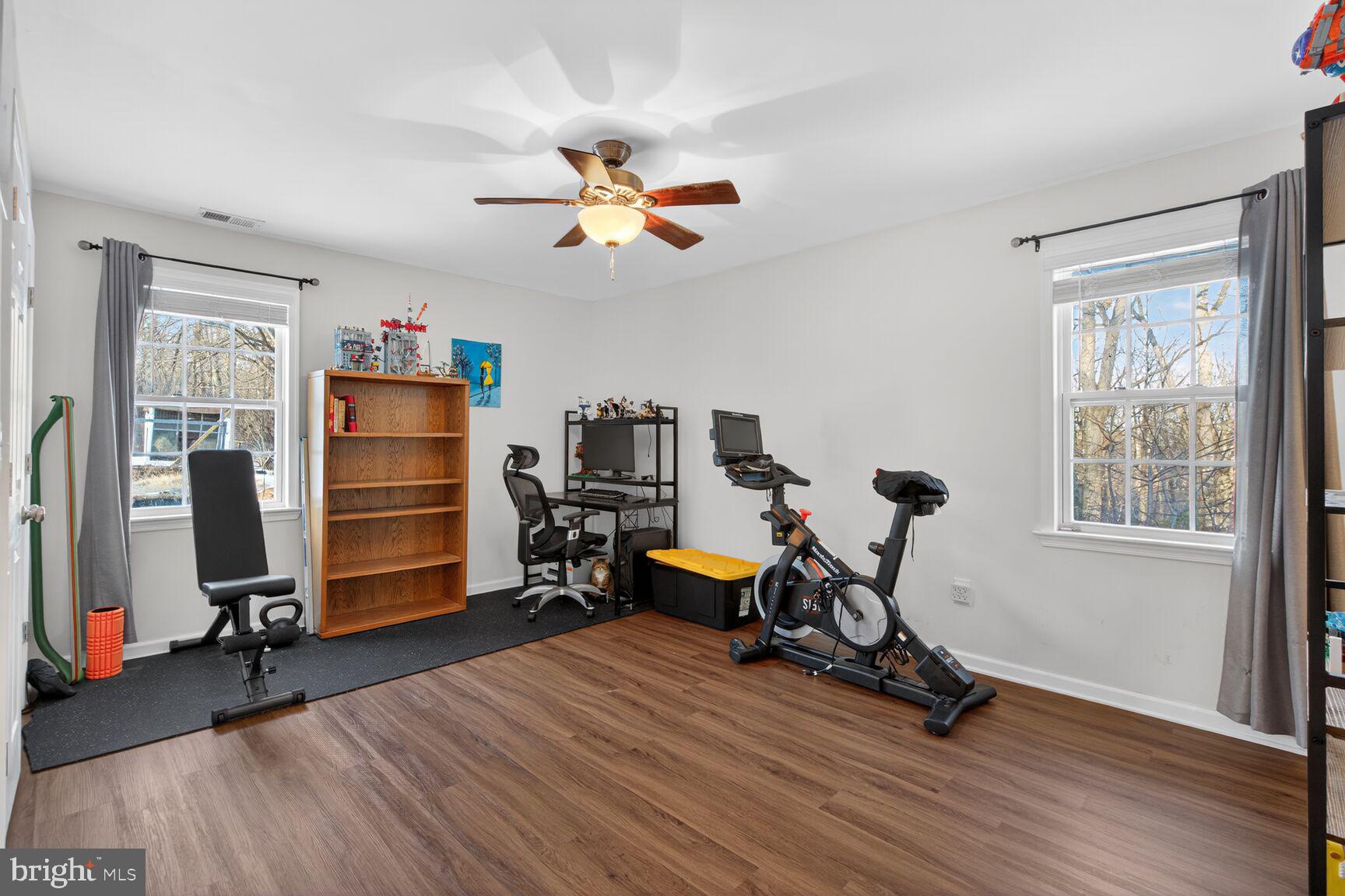 599 Widewater Road Stafford, VA 22554 - Photo 10 of 27 a view of a workspace with furniture and a window