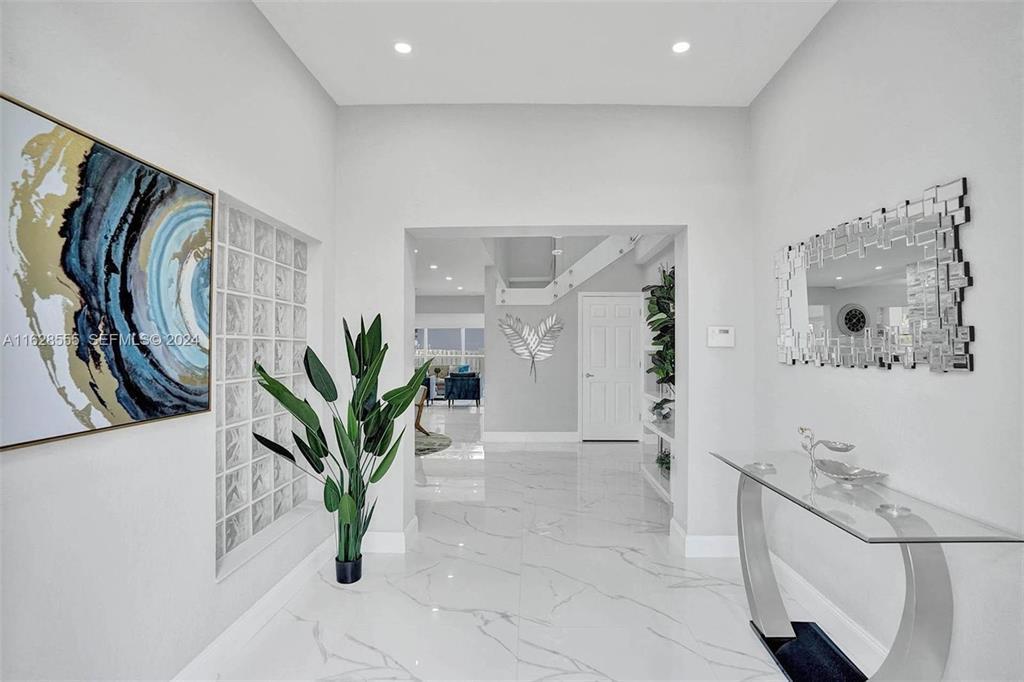 3421 Dover Road Pompano Beach, FL 33062 - Photo 19 of 22 a view of entryway with a potted plant