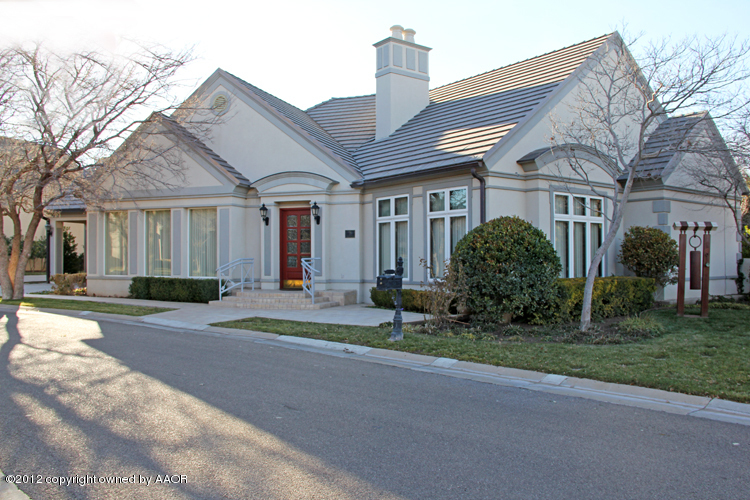 8 Edgewater Drive Amarillo, TX 79106 - Photo 1 of 41 a front view of a house with a yard and garage