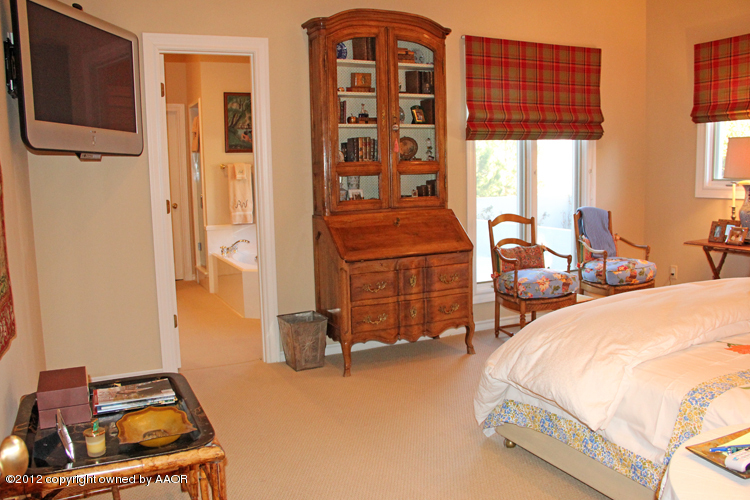 8 Edgewater Drive Amarillo, TX 79106 - Photo 13 of 41 a bedroom with bed and window