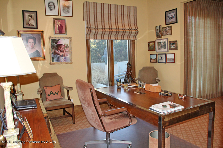 8 Edgewater Drive Amarillo, TX 79106 - Photo 17 of 41 a room with furniture and window