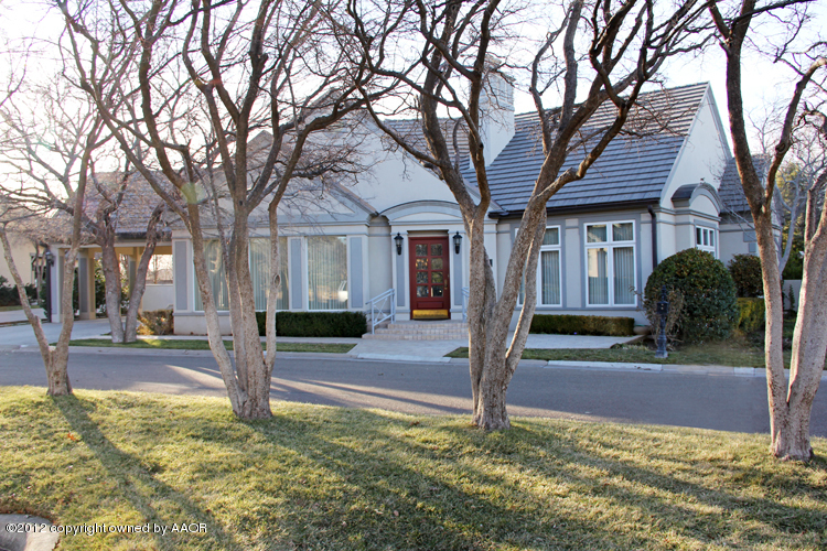8 Edgewater Drive Amarillo, TX 79106 - Photo 2 of 41 a view of a house with a tree in front of it