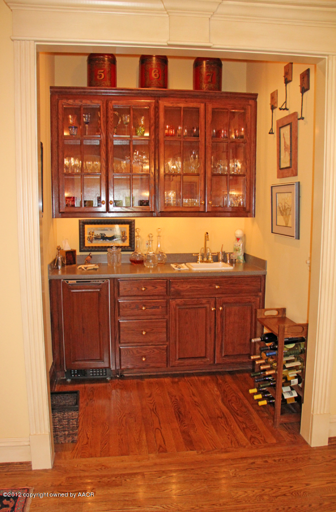 8 Edgewater Drive Amarillo, TX 79106 - Photo 24 of 41 a view of a kitchen with stainless steel appliances granite countertop a stove and a cabinets