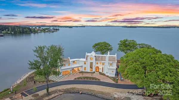 a view of a lake with a yard