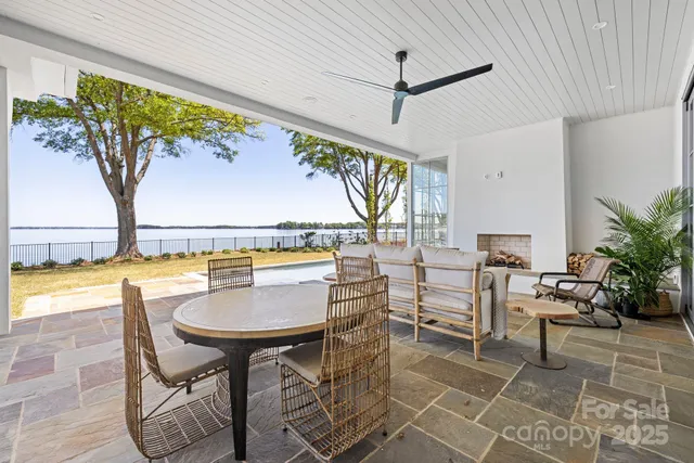 a view of a chairs and table in the patio