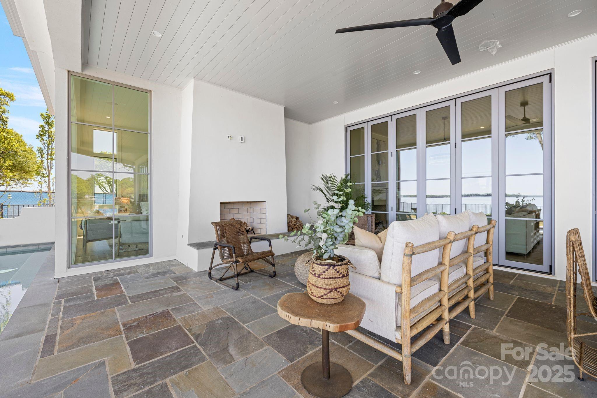 8397 Ranger Island Marina Road Denver, NC 28037 - Photo 14 of 48 a dining room with furniture and a window