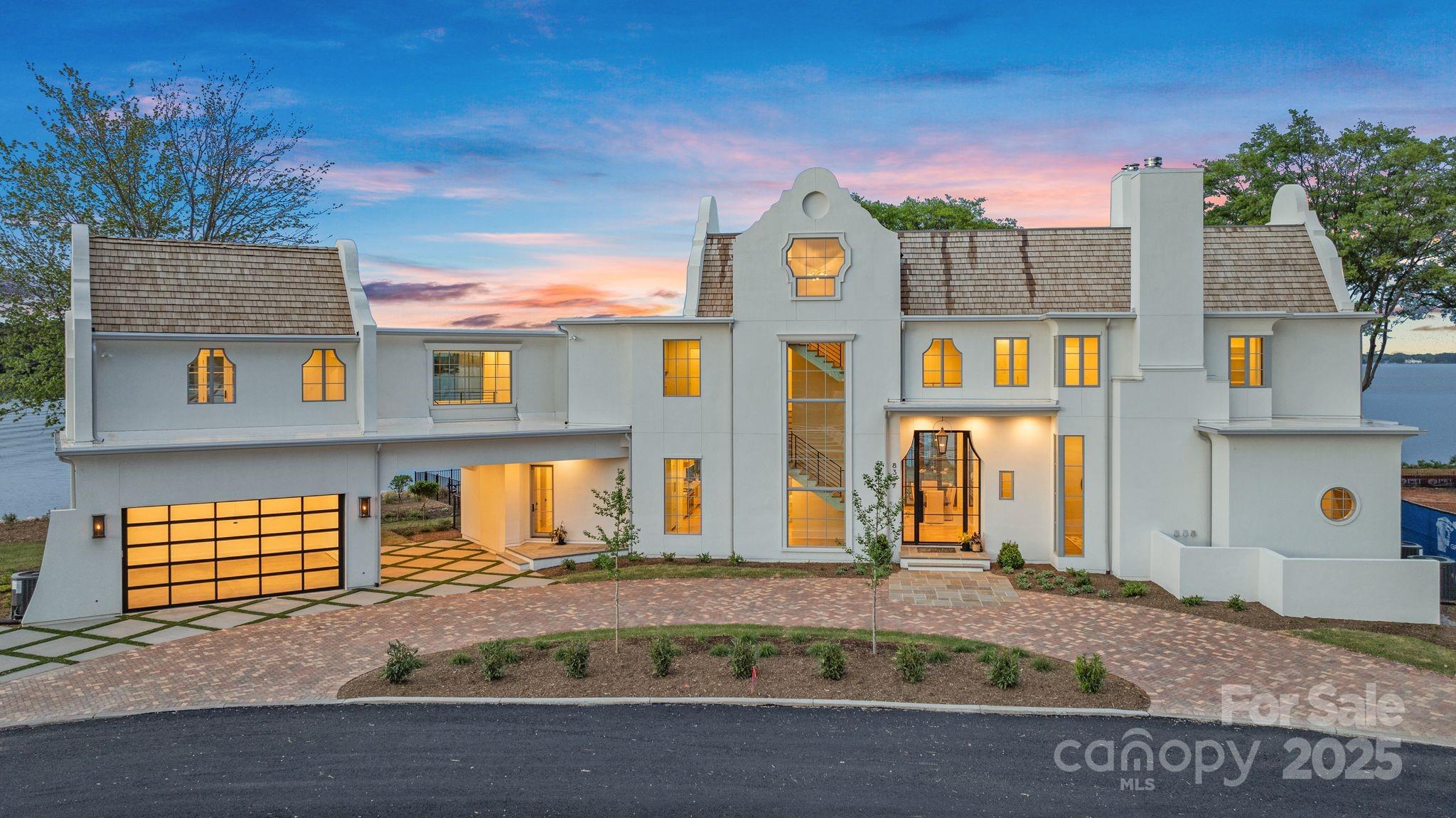 8397 Ranger Island Marina Road Denver, NC 28037 - Photo 2 of 48 a front view of a house with a yard