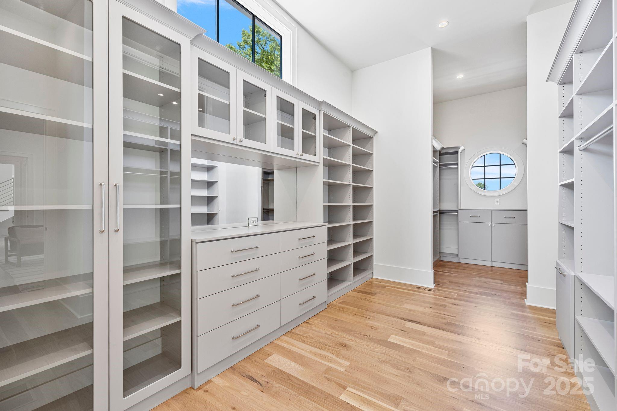 8397 Ranger Island Marina Road Denver, NC 28037 - Photo 28 of 48 a view of walk in closet with empty racks