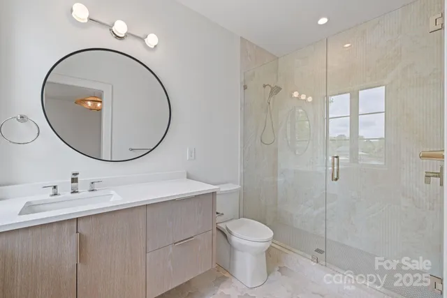 a view of cabinets a sink and a window in a room