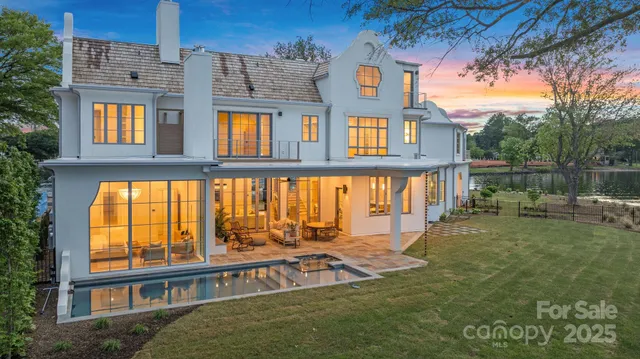 aerial view of a house with a yard