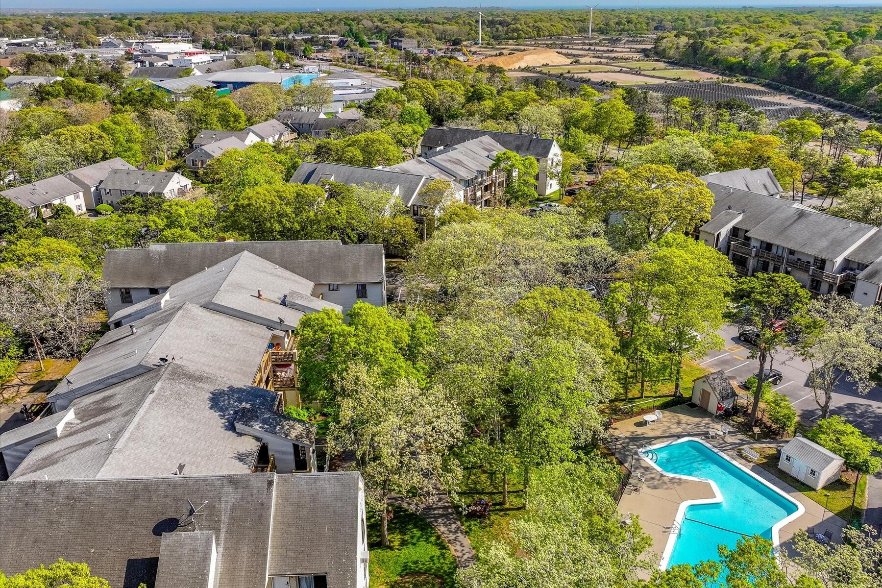 800 Bearses Way, Unit 1EB Hyannis, MA 02601 - Photo 35 of 37 an aerial view of residential houses with outdoor space