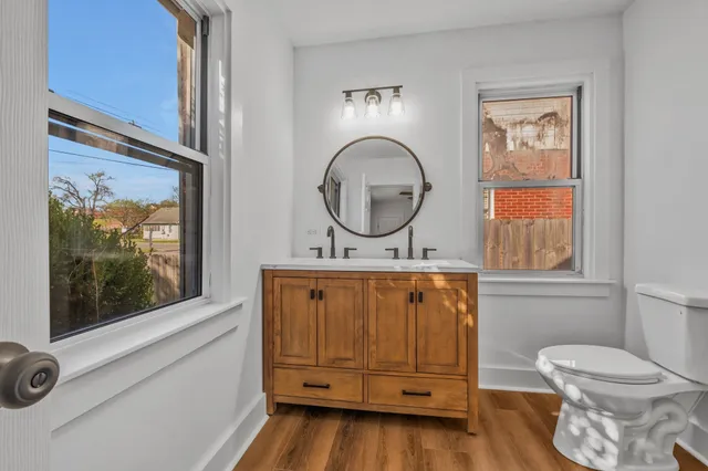 a bathroom with a glass shower door