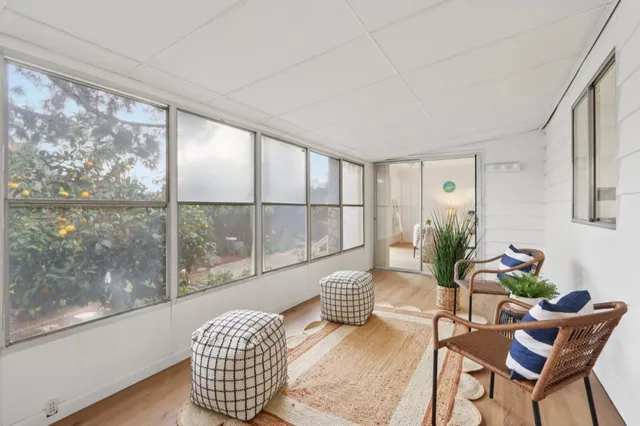 a view of balcony with furniture