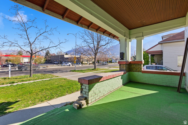 869 West Center Street Provo, UT 84601 - Photo 6 of 32 View of home's community featuring covered porch and a residential view