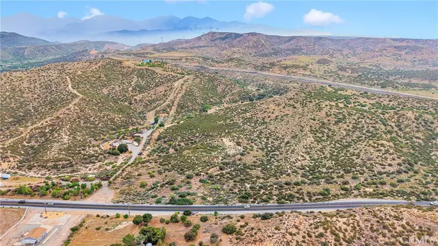 a view of ocean and mountain