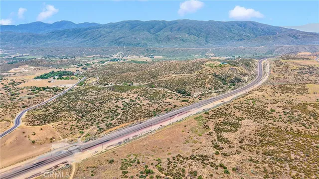 a view of a yard with wooden floor