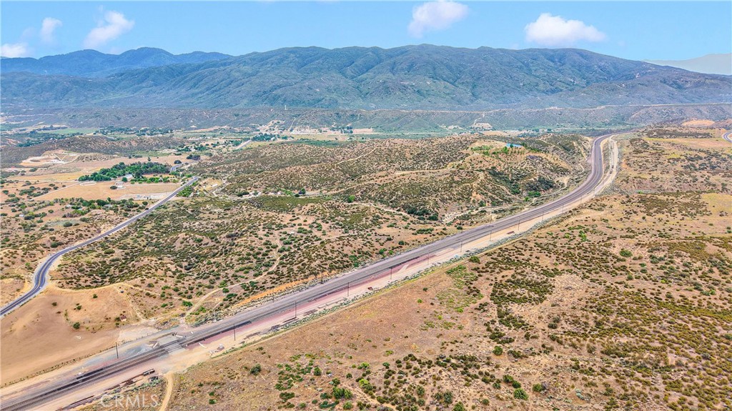 4550 Summit Valley Road Hesperia, CA 92345 - Photo 4 of 19 a view of a yard with wooden floor