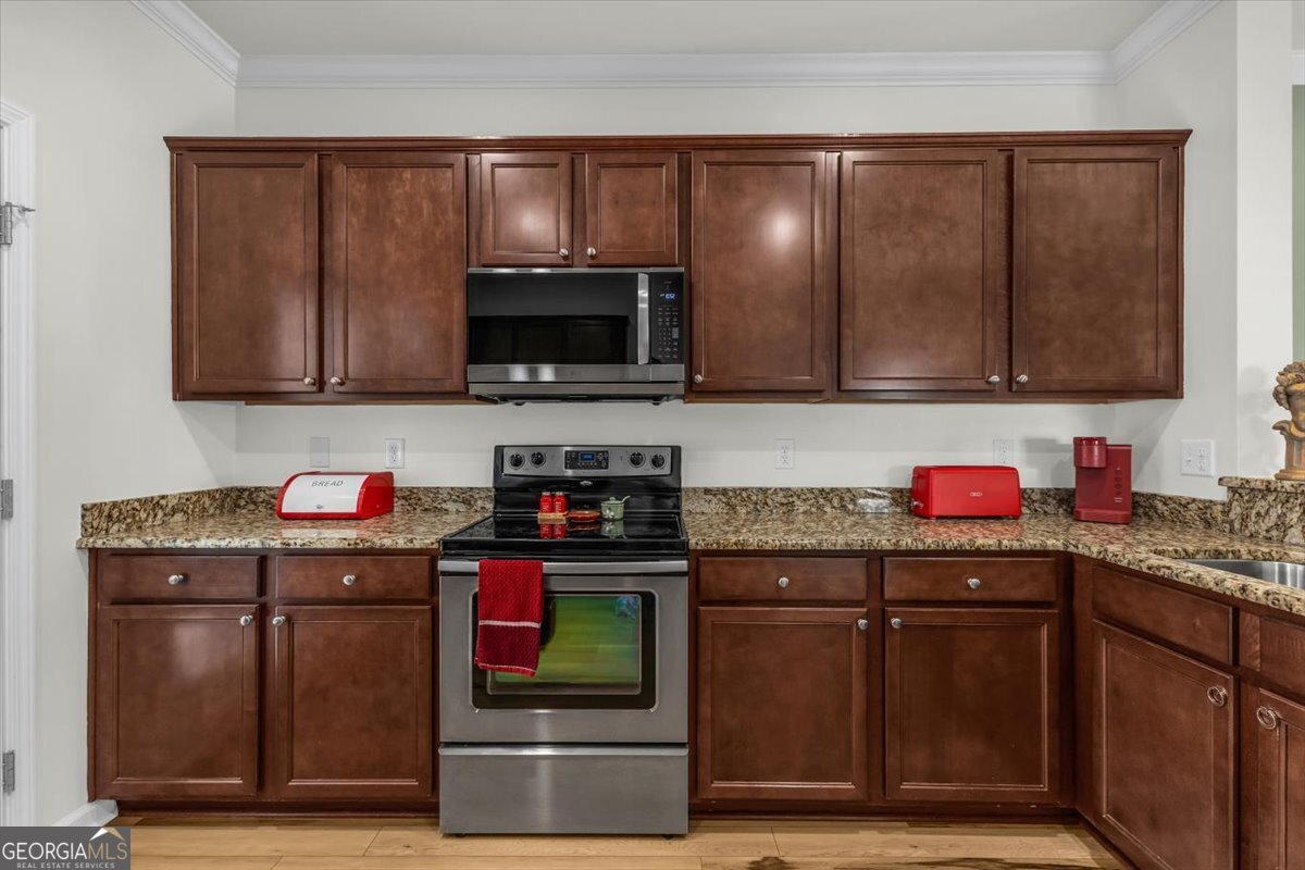 2 Crestview Circle Pooler, GA 31322 - Photo 14 of 55 a kitchen with stainless steel appliances granite countertop a refrigerator and a stove top oven