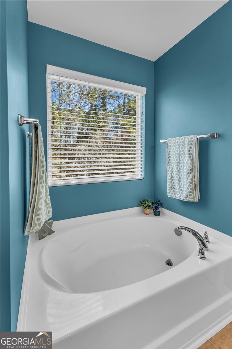 2 Crestview Circle Pooler, GA 31322 - Photo 30 of 55 a bathroom with a bathtub and a shower