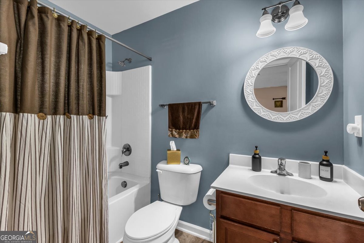 2 Crestview Circle Pooler, GA 31322 - Photo 33 of 55 a bathroom with a toilet a sink and a mirror